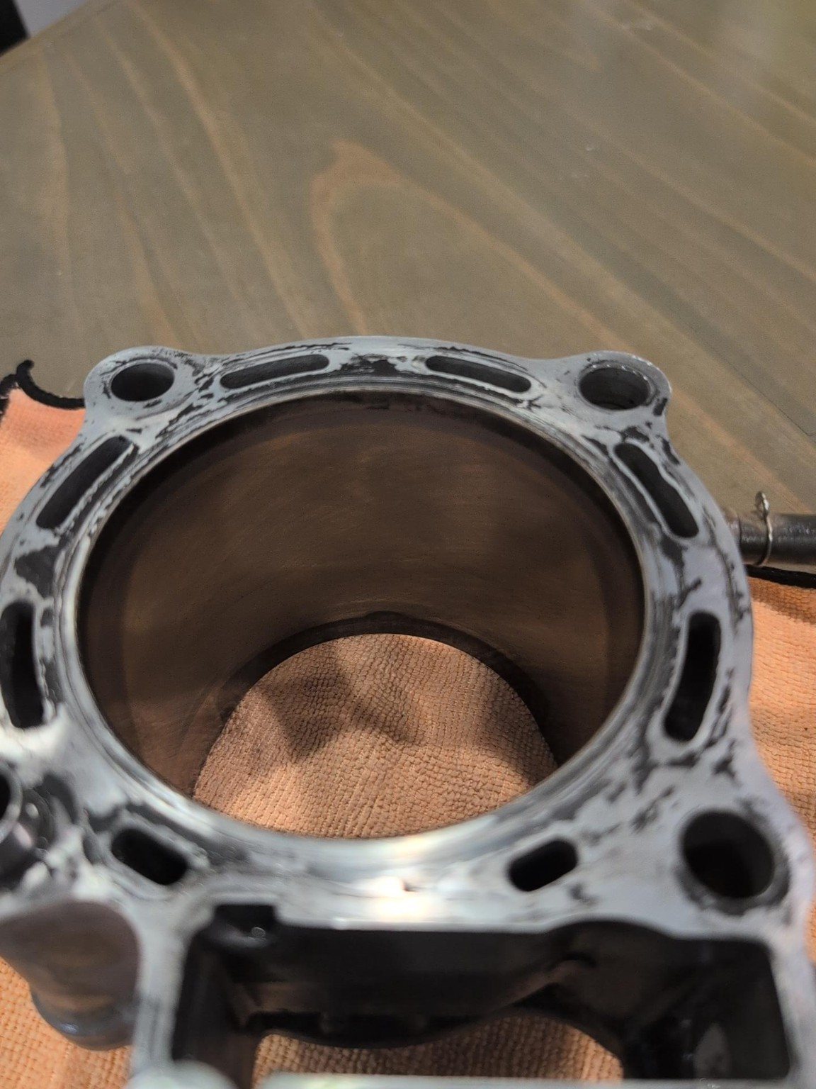 Close-up inspection of Honda TRX450 cylinder bore